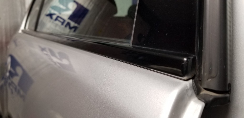 inspecting a car for paintwork